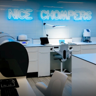 Custom Neon® Nice Chompers sign in the dental technician lab @bauerdentalcom