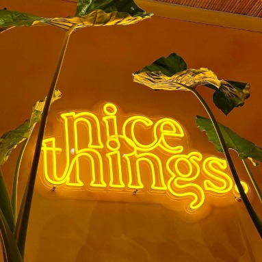 Warm white retail display sign by Custom Neon® @nice.things.plant.store