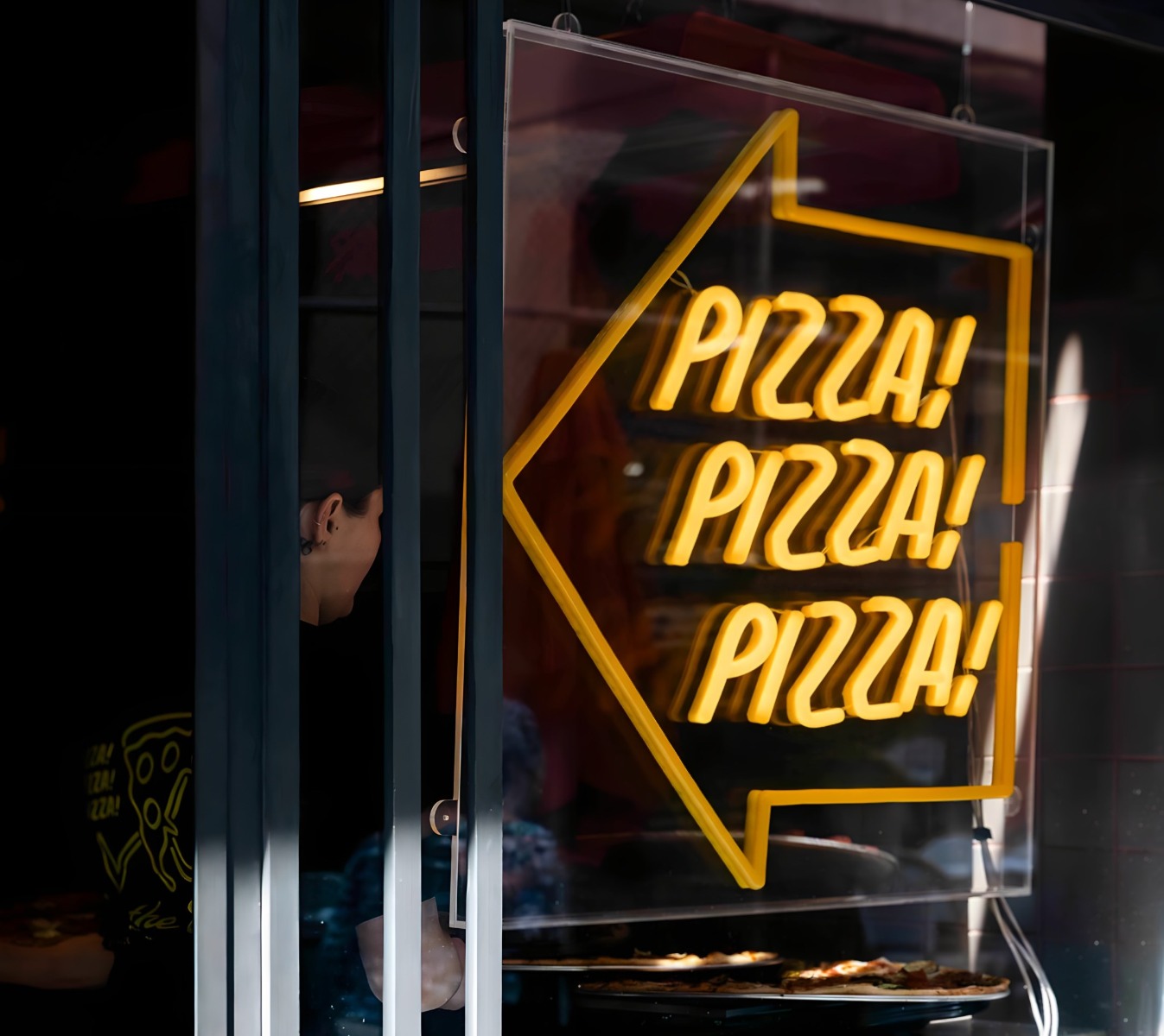 Animated yellow logo sign made by Custom Neon® for @pizzapizzapizzamelb