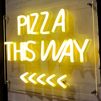 Yellow pizza this way arrow sign by  Custom Neon® @augustopizzeriachester