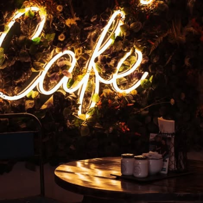 Warm white Custom Neon® cafe name sign @risingcafebirmingham