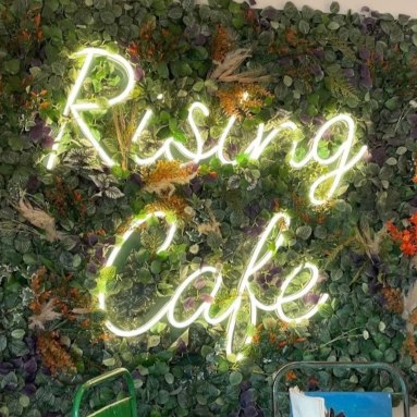 Warm white Custom Neon® cafe name sign @risingcafebirmingham