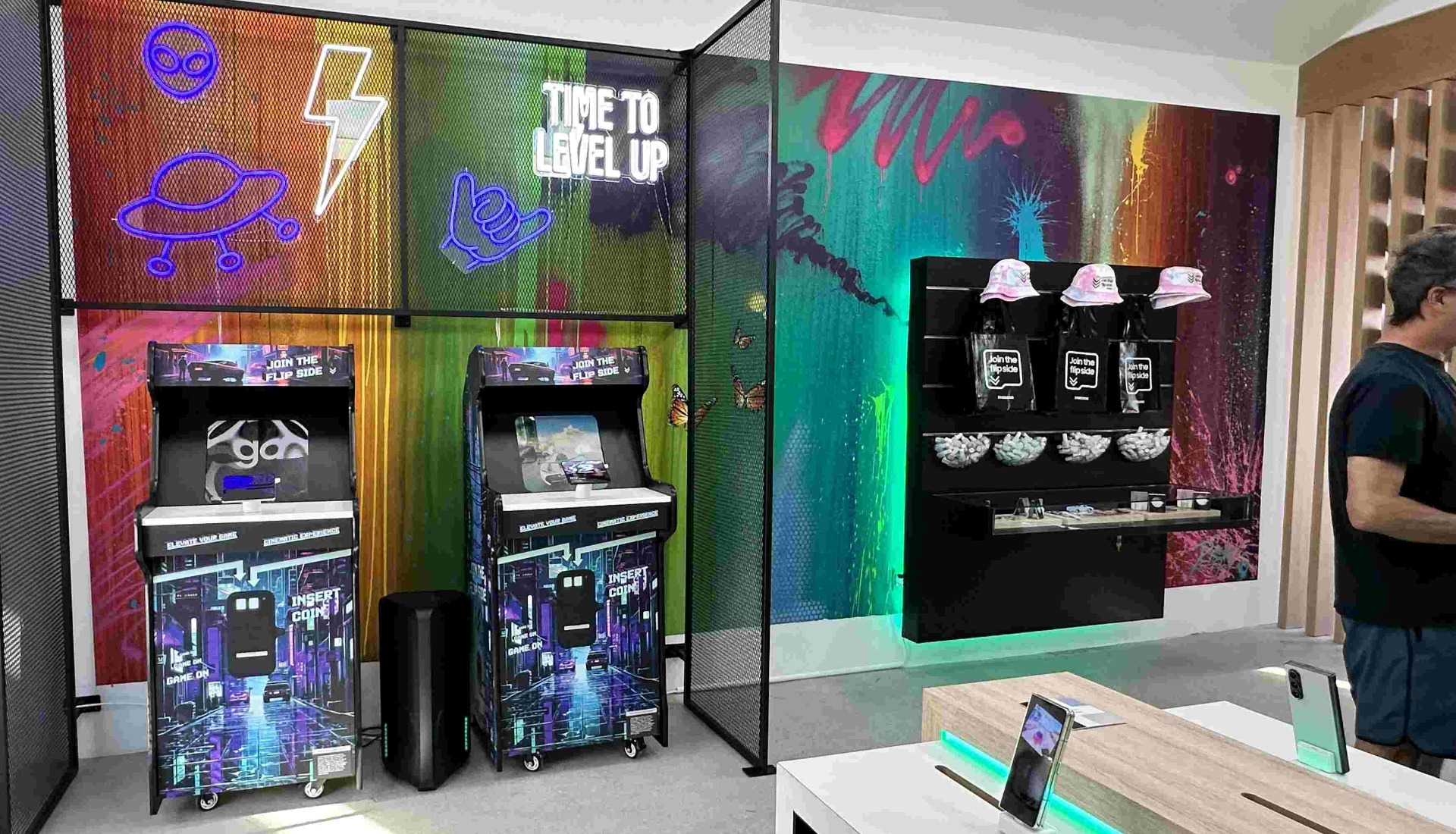 Retro Custom Neon&reg; gaming signs above the video games in the   Samsung Flip Side Pop-Ups