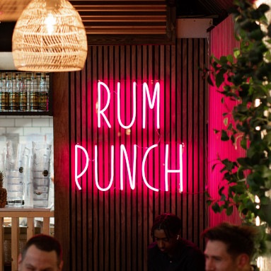 Pink Custom Neon® sans-serif sign in buttercup typeface @marketplacevauxhall