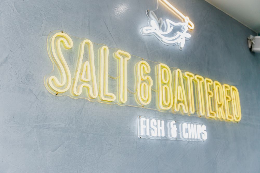 Salt & Battered colour changing Custom Neon® RGB sign on yellow