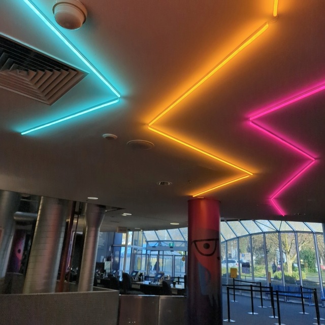 Colorful LED neon zig zags mounted on the ceiling @scienceworks