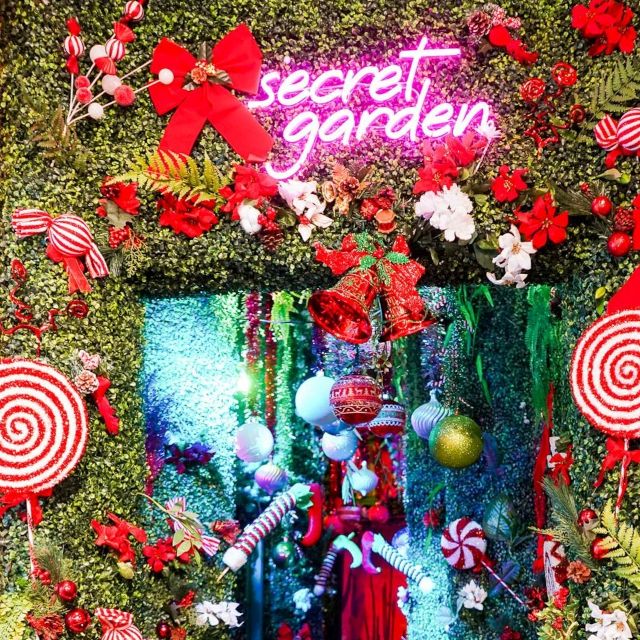 Pink Custom Neon® Secret Garden sign at a Christmas grotto @the_exhibit_house