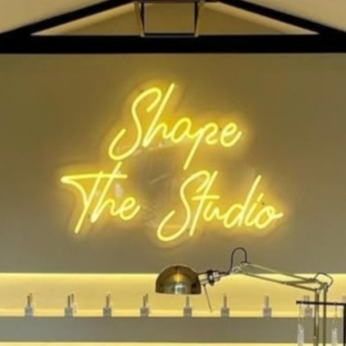 Warm white nail salon namesign by Custom Neon® @shapethestudio
