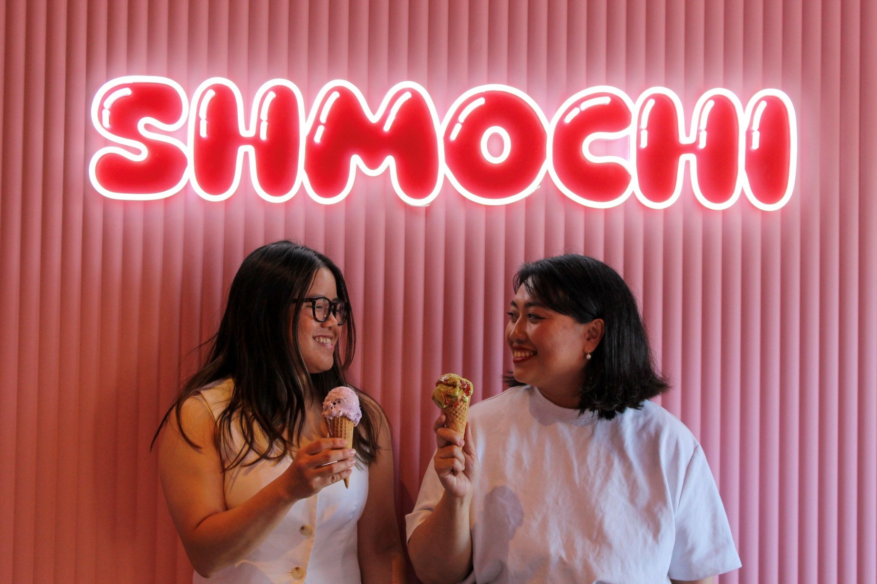 Mochi Ice Cream shop logo sign by Custom Neon® in red and white on a red and white striped wall @shmochi_byshibu