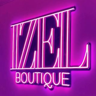 Custom Neon® logo in pink LED on black acrylic @shopizelboutique
