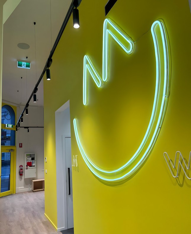 Yellow Custom Neon® smiley face brand art @upstate_studios @loopelec