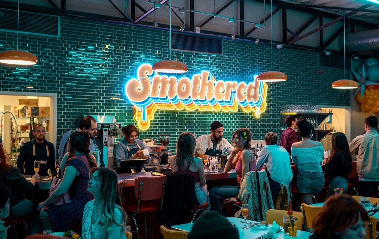 Multicolored large restaurant sign by Custom Neon® @smotheredbrunch