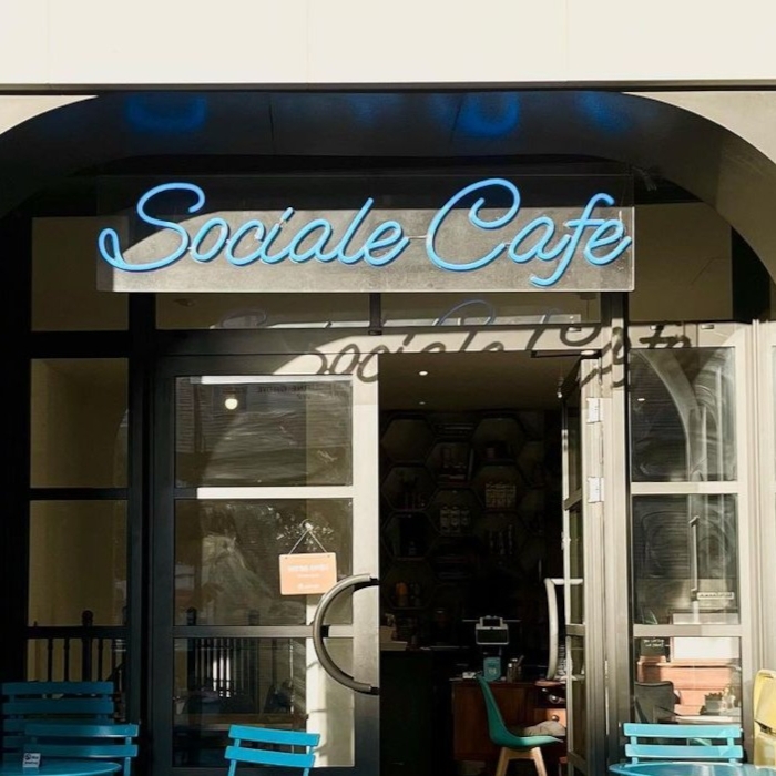 Blue outdoor cafe name sign by Custom Neon® @socialecafe_