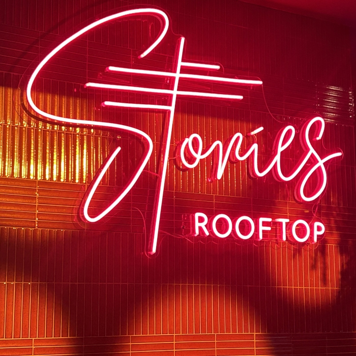 Custom Neon® colour changing LED neon Stories Rooftop sign @stories.au