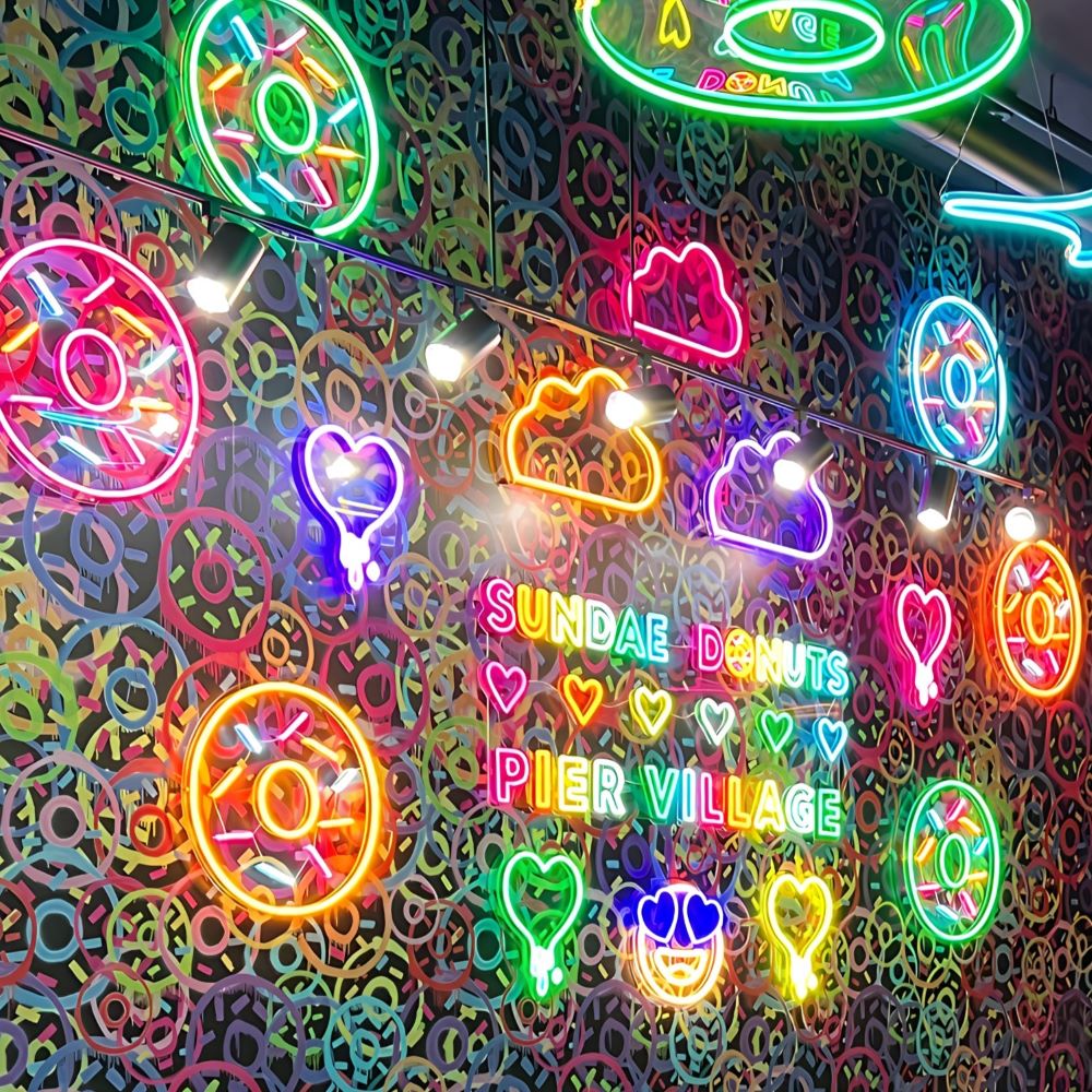 Colourful Custom Neon® artwork and ceiling hung signs @sundaedonutspiervillage