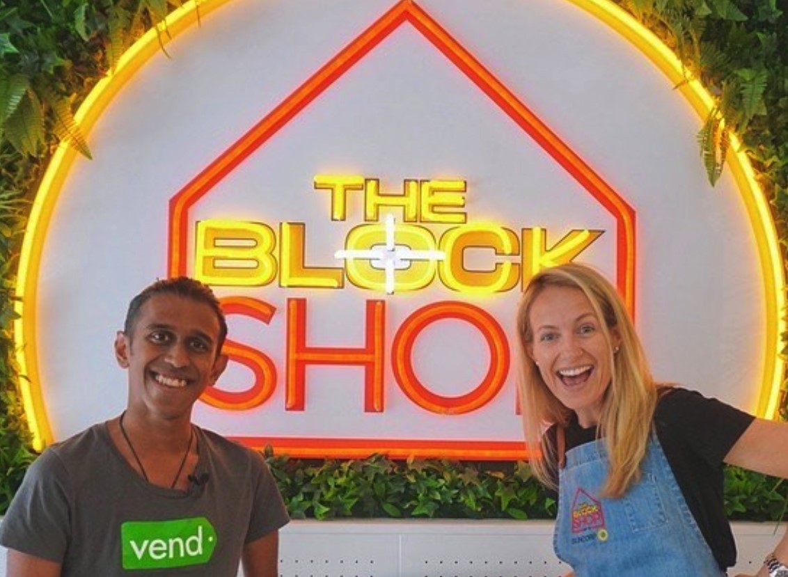 @theblockshop logo in red & yellow LED neon & UV print on white acrylic backboard by Custom Neon®