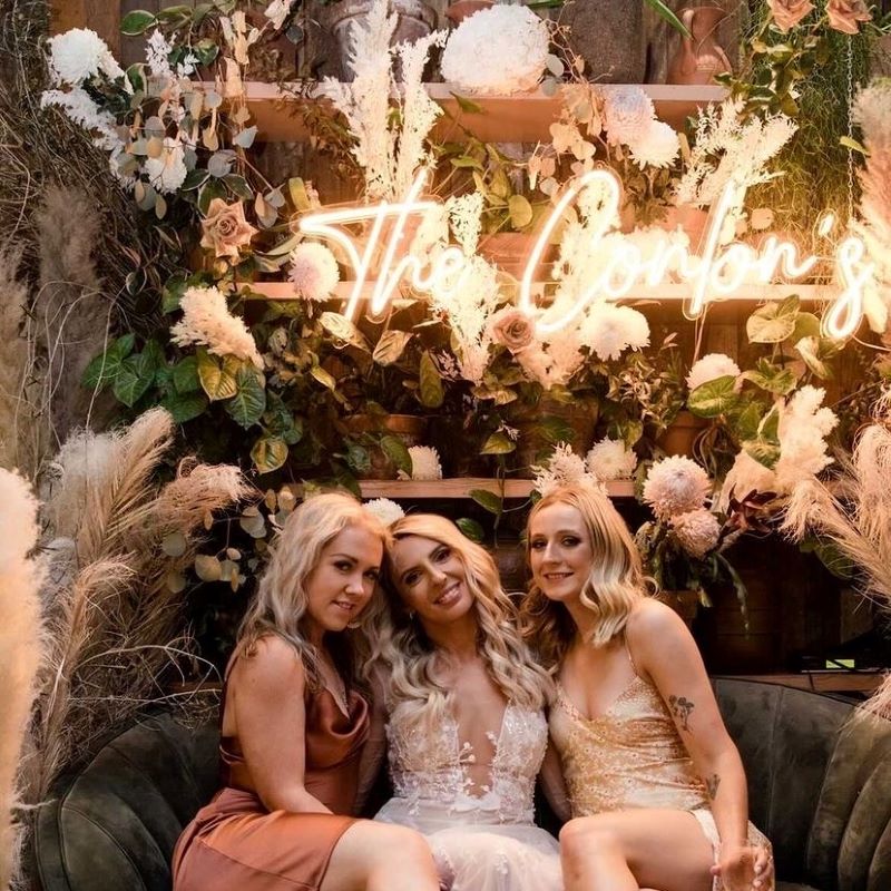 Orange Custom Neon® wedding last name sign