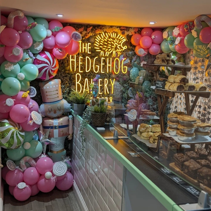 Yellow bakery established sign by Custom Neon® @thehedgehogbakery