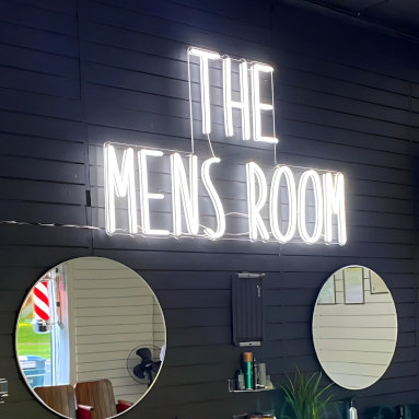White Custom Neon® barber sign @themensroomfriarscorner