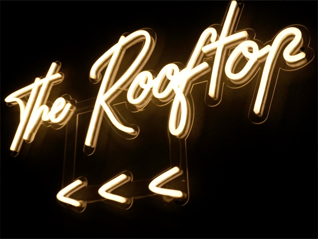 Custom Neon® warm white wayfinding signage The Rooftop @thebeaufortperth