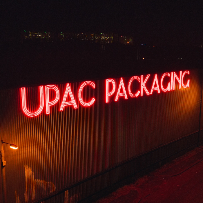 Large red Custom Neon® outdoor sign in Glasgow @upacpackaging
