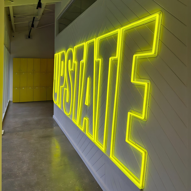 Custom Neon® fitness studio branded signage @upstate_studios