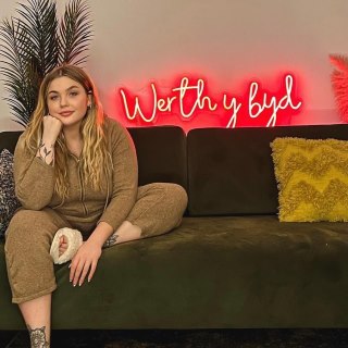 Red Custom Neon® Werth y Byd custom neon sign in living room @maredparry