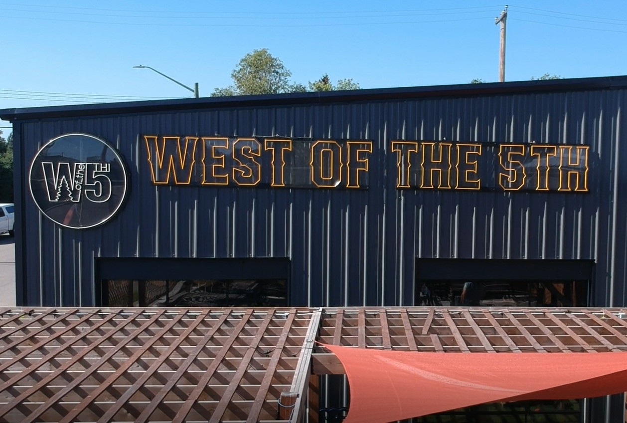 Huge Custom Neon® outdoor logo sign @westofthe5th