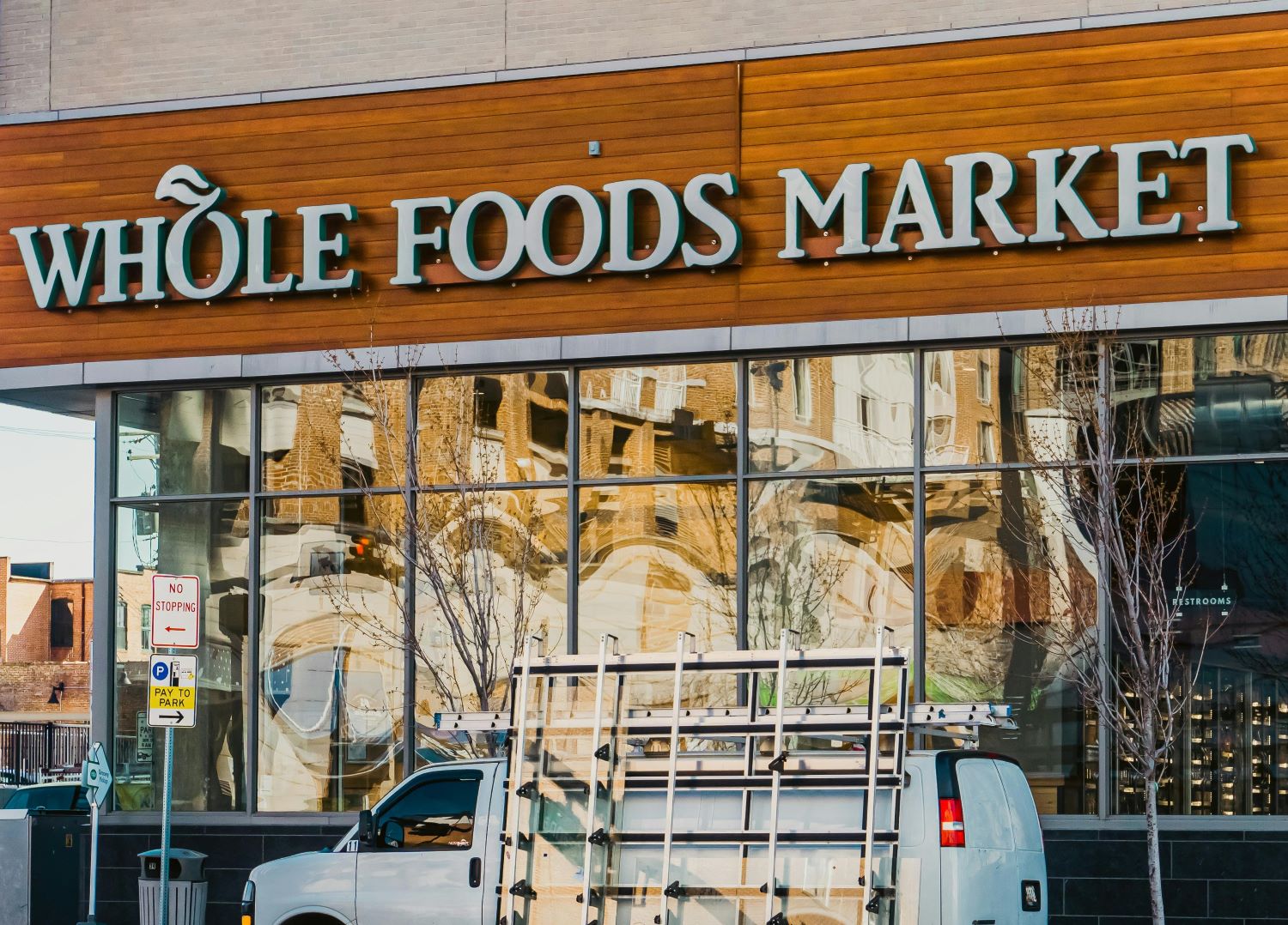 Whole Foods Market signage outside a store - photo by Tranise Foster @pexels