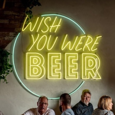 Large multicolored Custom Neon® quote sign in bar @o.creek.brewing
