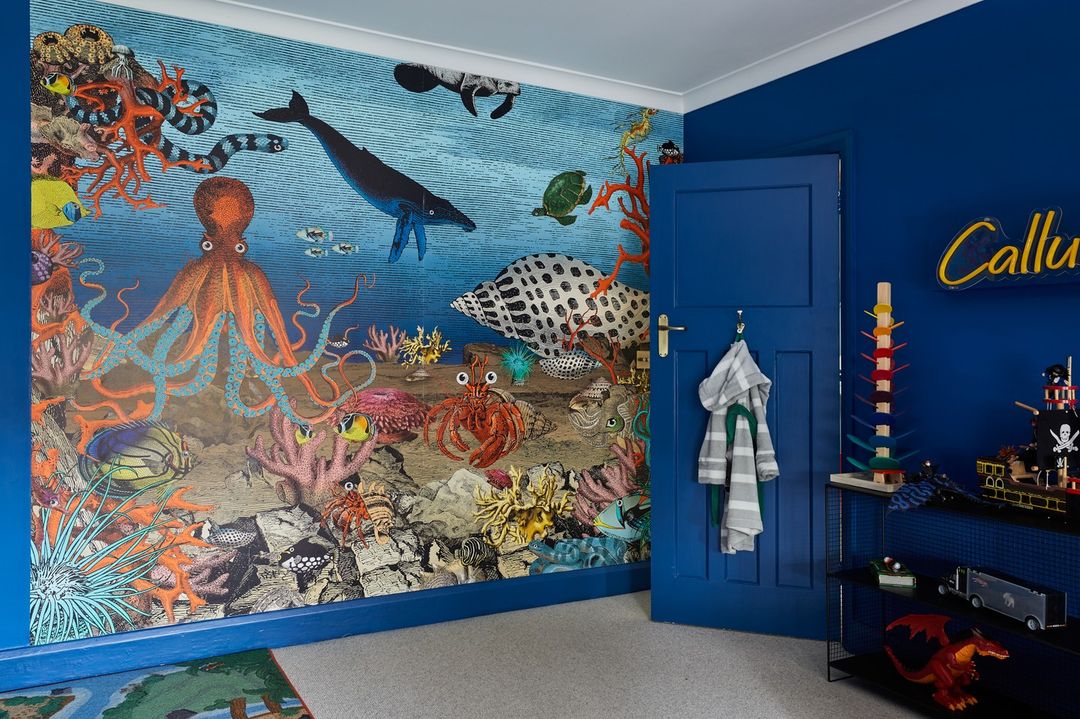 Custom Neon® yellow boys name sign in an underwater themed bedroom with sea creature mural @dorisleestudio