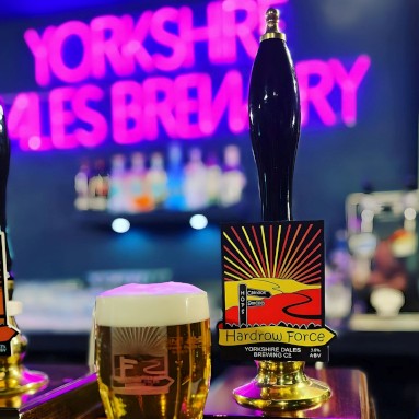 Custom Neon® pink Yorkshire Dales Brewery sign on a dark wall behind the bar @yorkshiredalesbrewery